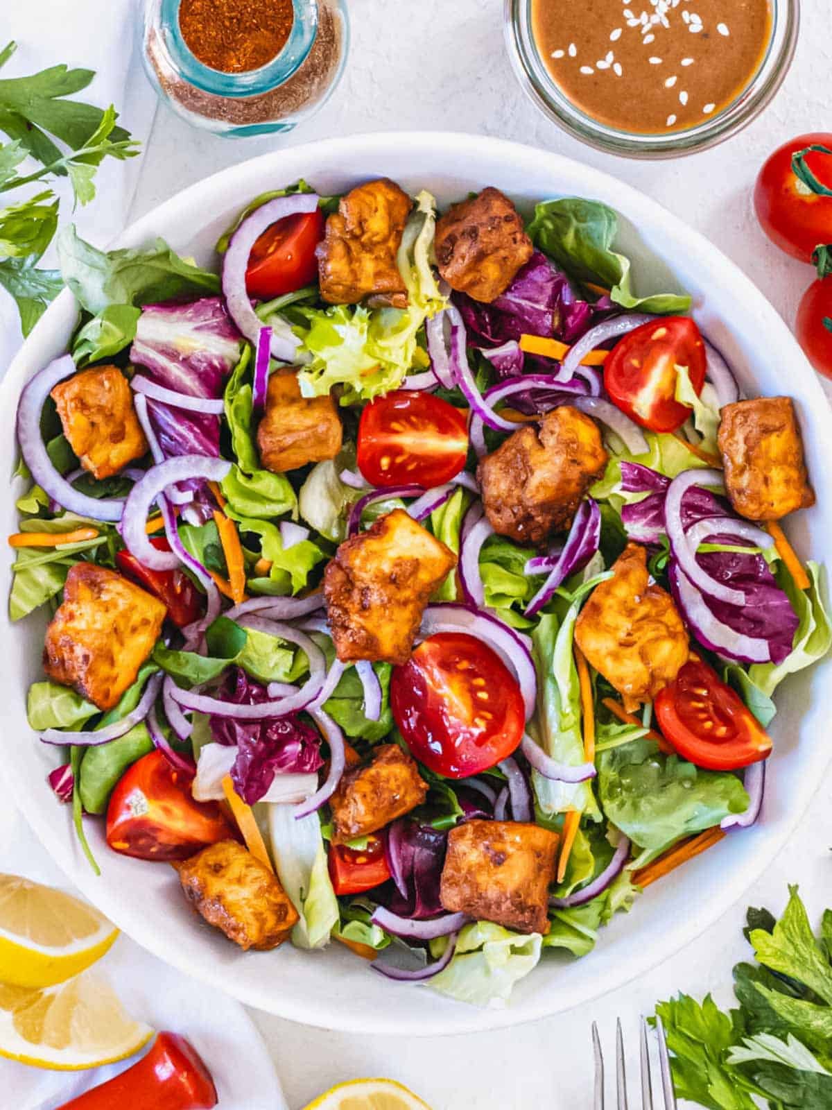 Air fryer tofu on salad.