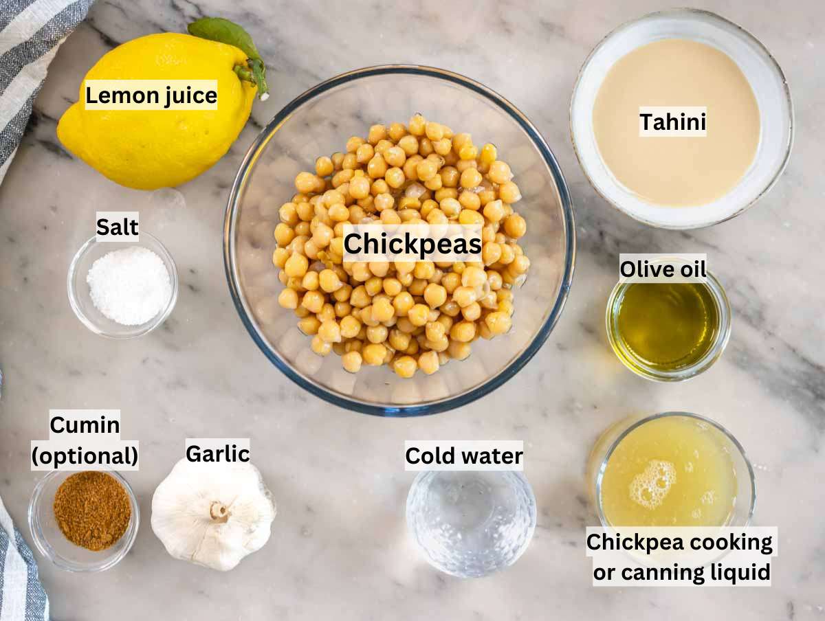 Ingredients picture with hummus ingredients on a marble table
