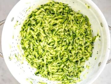 Step 1 Grated zucchini in a colander tossed with salt.