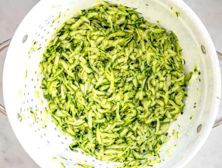Step 1 Grated zucchini in a colander tossed with salt.