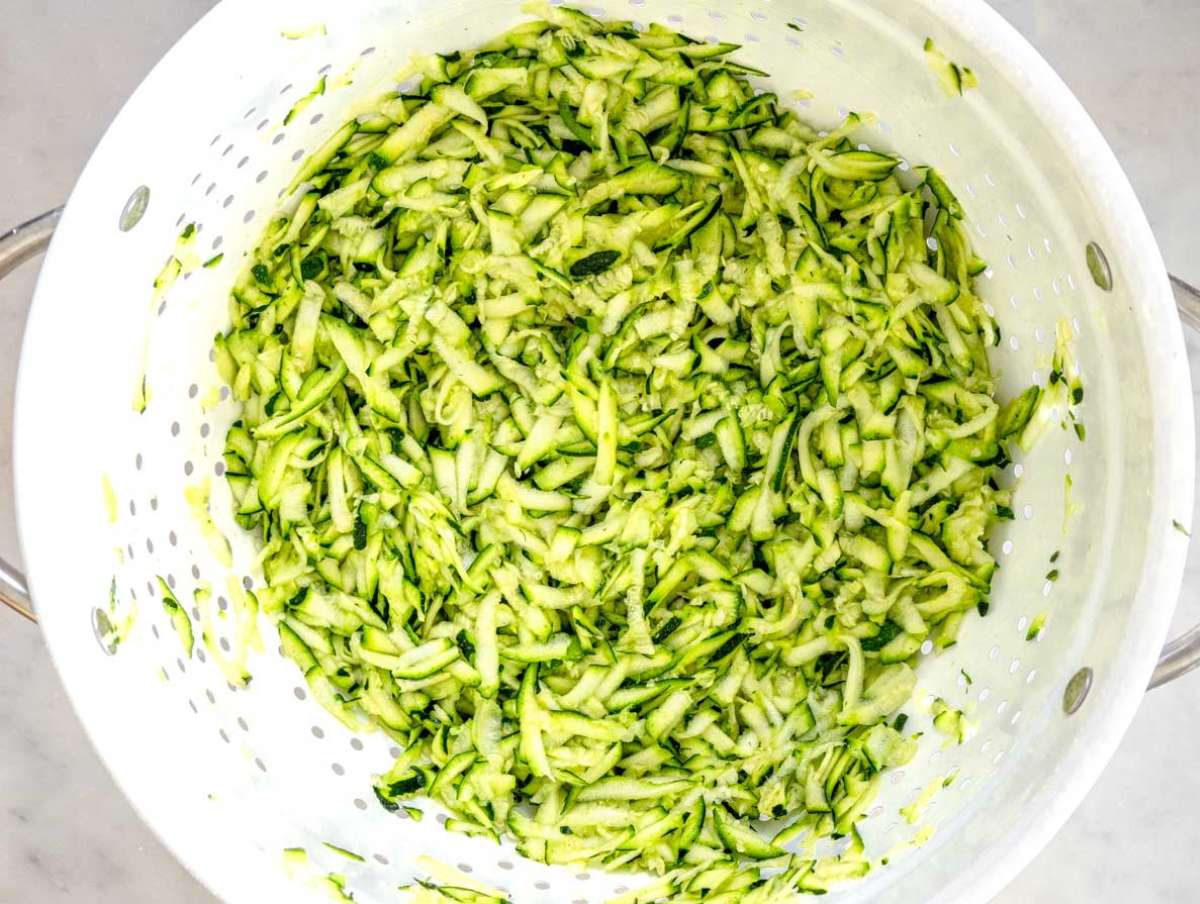 Step 1 Grated zucchini in a colander tossed with salt.