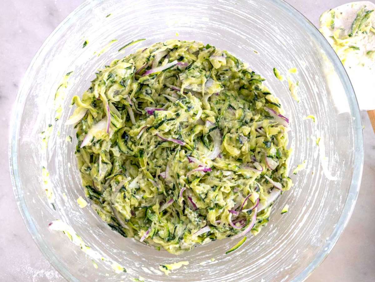 Step 3 Zucchini batter in a mixing bowl.