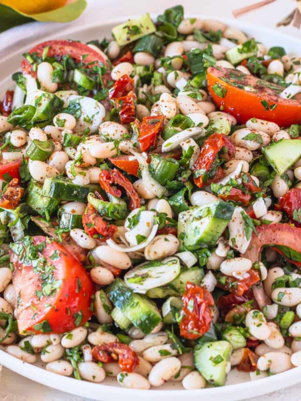 White bean salad on a plate.