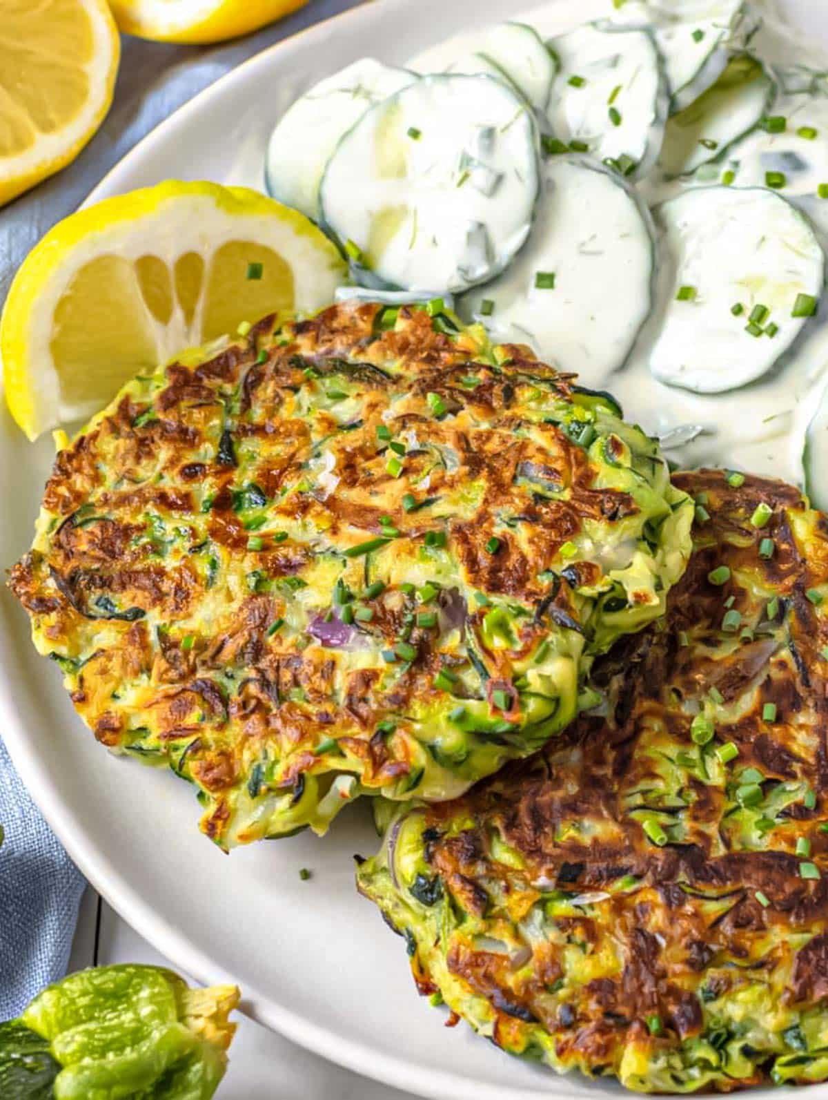 Zucchini fritters with cucumber salad.