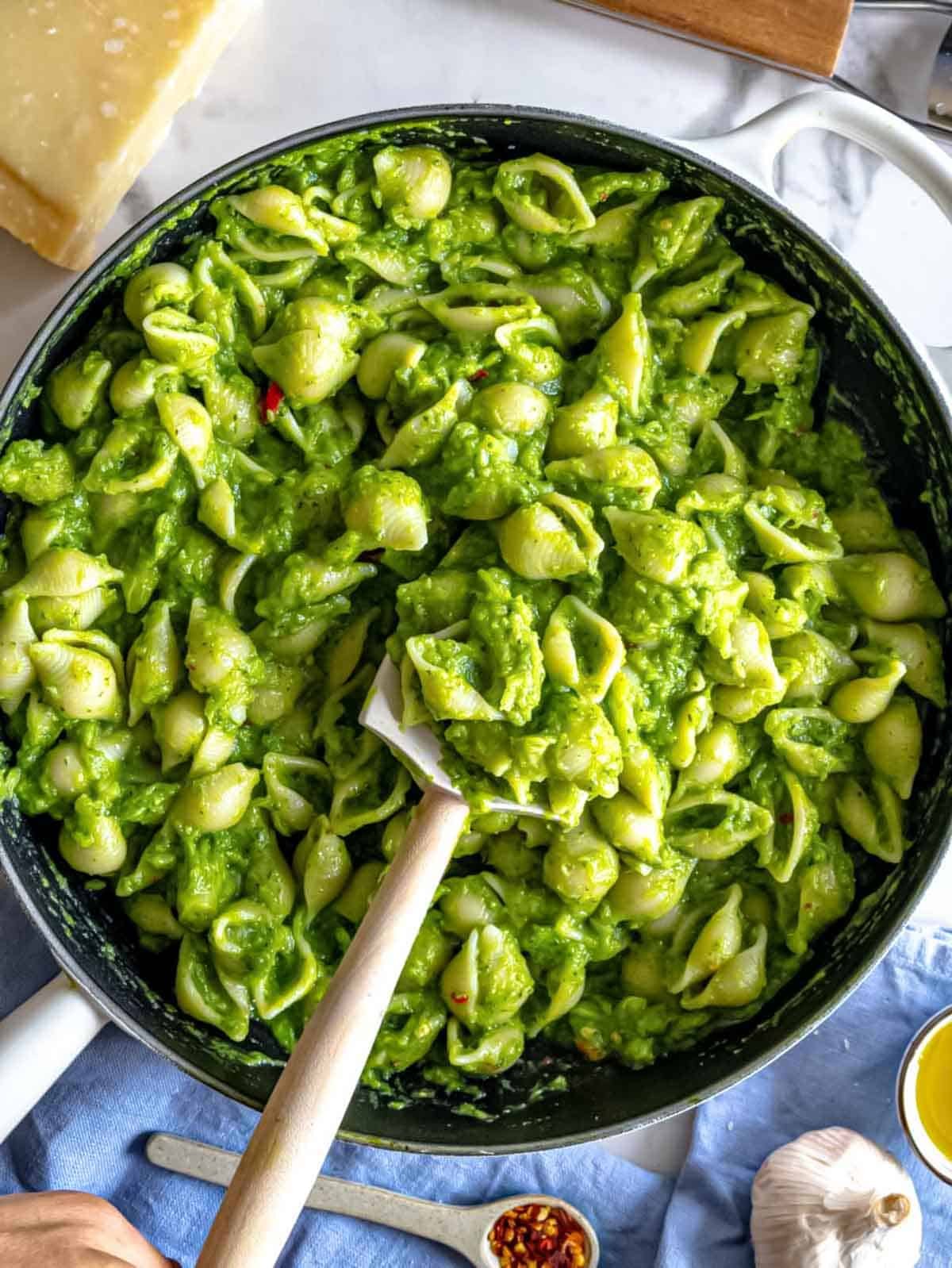 Broccoli pasta in a skillet.