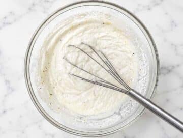 Step 2 Ricotta, Parmesan, lemon zest, and pasta water whisked into creamy sauce.