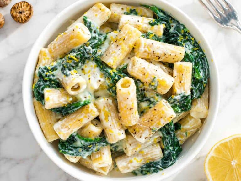 Step 3 Rigatoni tossed with creamy ricotta sauce until glossy and evenly coated.