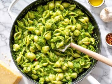 Step 4 Pasta tossed with creamy broccoli sauce and Parmesan until glossy.
