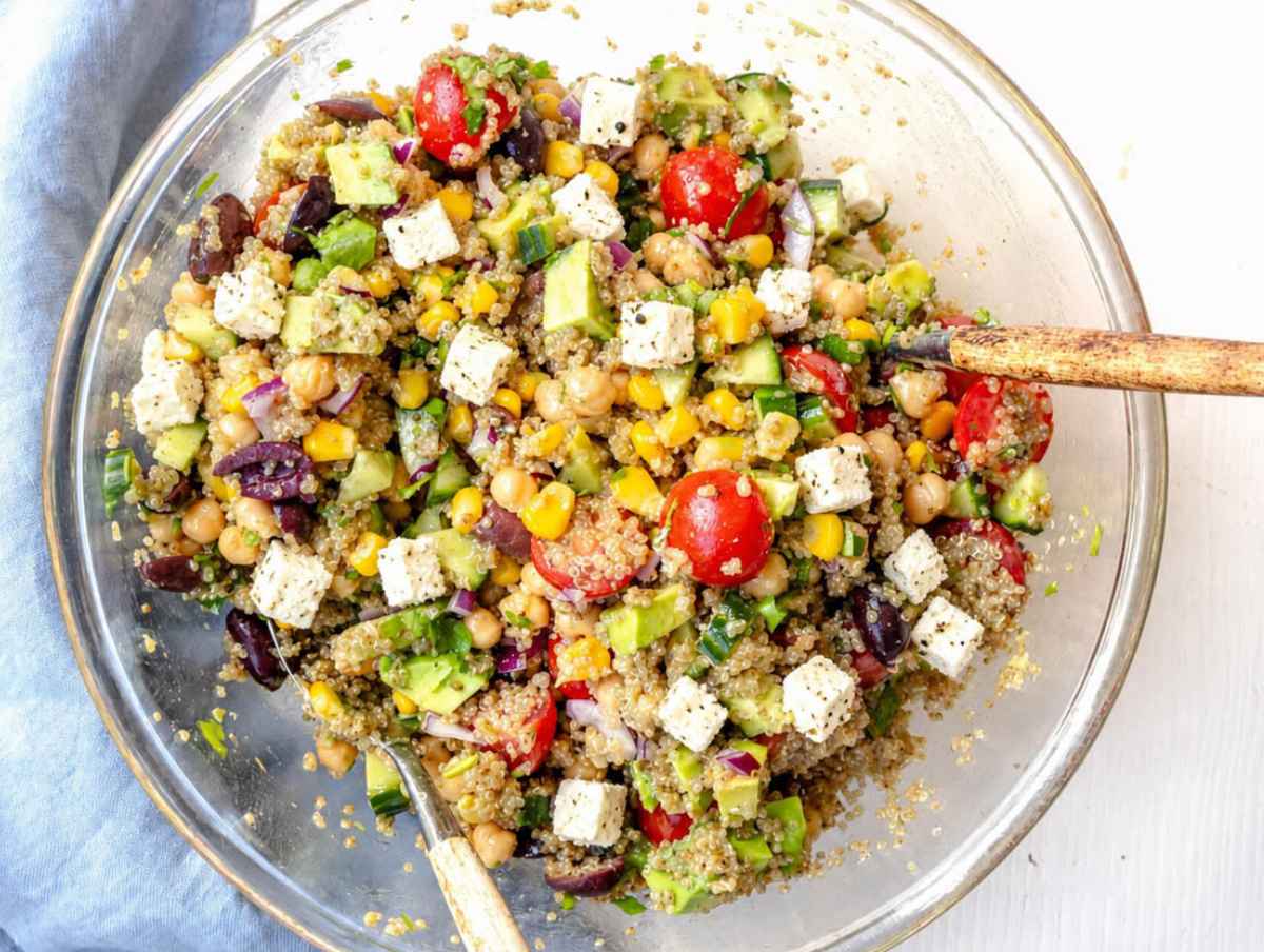 Step 4 Quinoa, chickpeas, vegetables, and feta tossed together until evenly dressed.