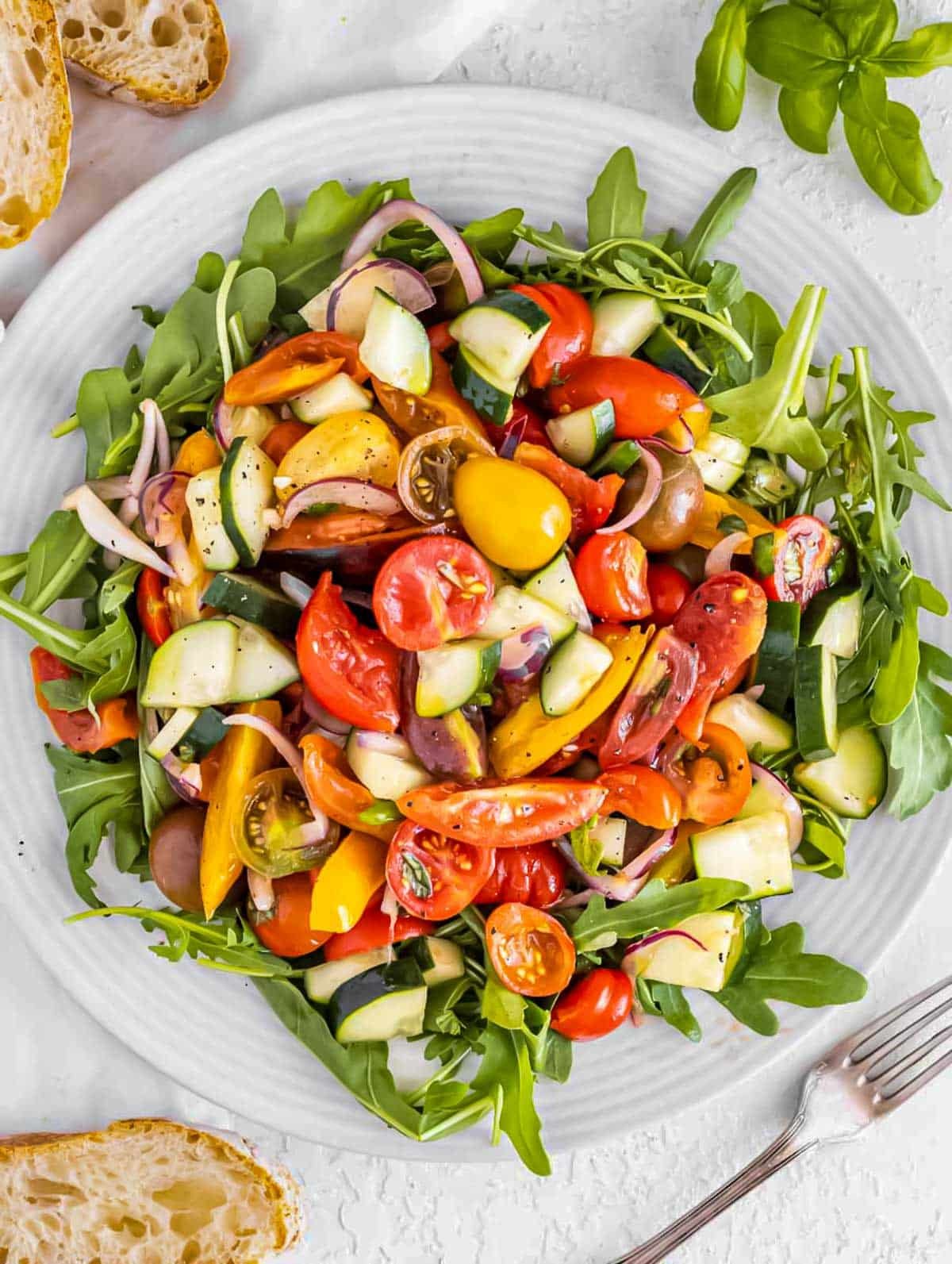 Tomato cucumber salad and how to serve it.