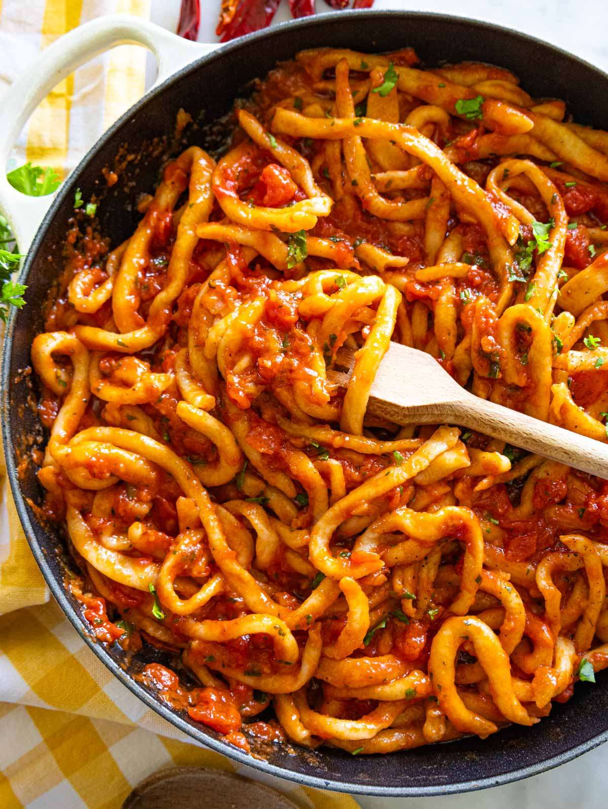 Tuscan pici pasta with aglione sauce