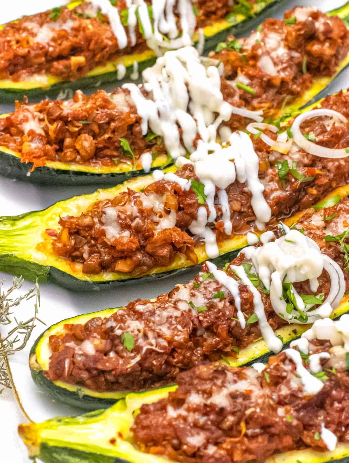 Zucchini boats with sour cream.