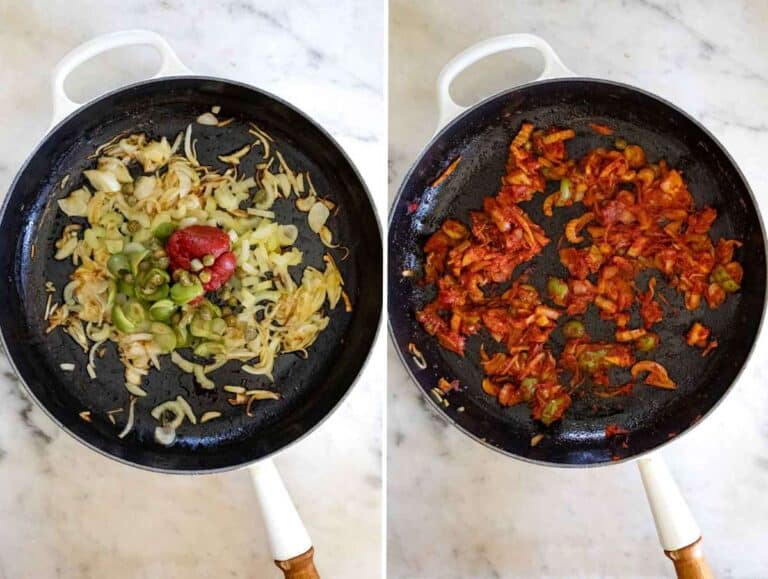 Caponata sauce with olives, capers, raisins, and tomato paste simmering in a pan.