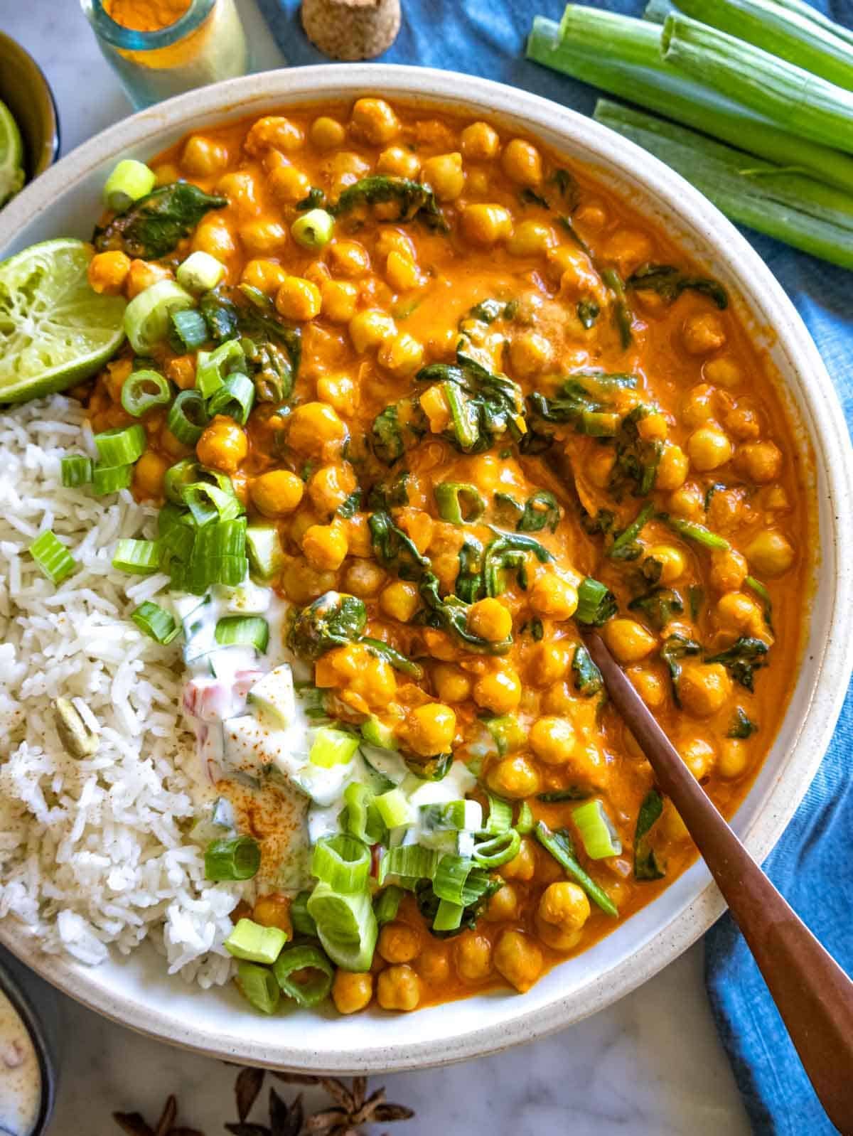 Chickpea curry with basmati rice, spinach and lime.