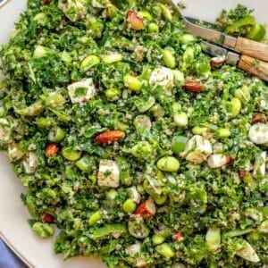 Colorful kale quinoa salad with feta and lemon dressing, a high-protein vegetarian recipe.