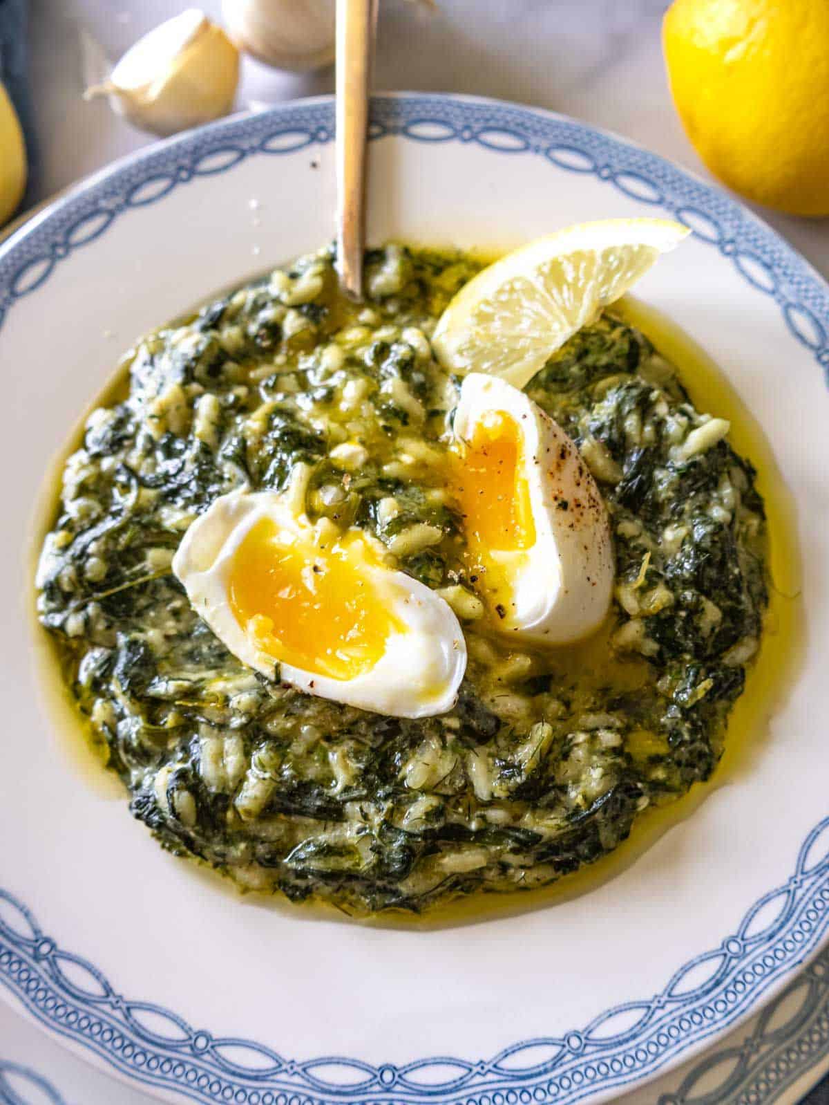 Creamy spanakorizo with rice spinach and feta close-up of healthy Greek comfort food.