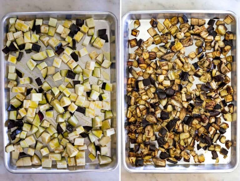 Diced eggplant on a baking tray, seasoned beofre and after baking.