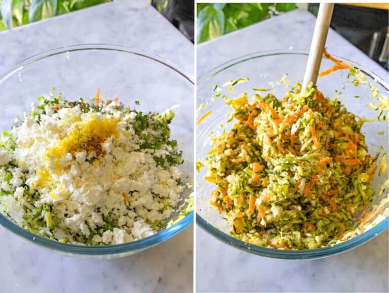 Large mixing bowl filled with zucchini, carrots, herbs, feta, eggs, and seasonings before combining.