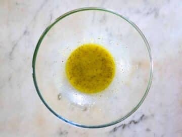 Olive oil based dressing for the summer pasta salad.