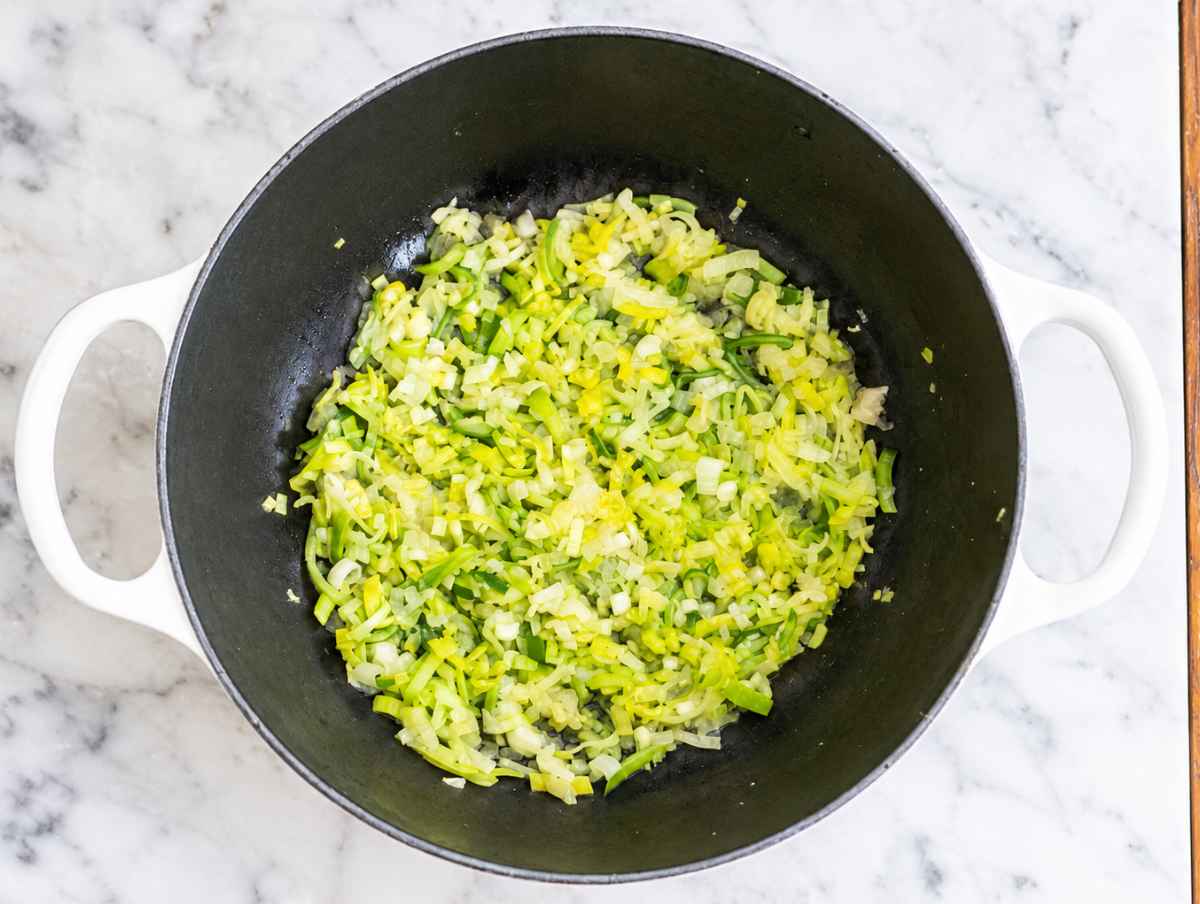 Step 1 Onion, scallions, leek, and garlic softening in olive oil.