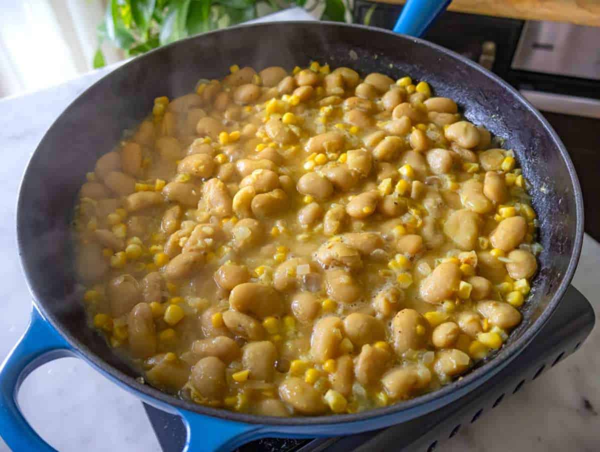 Step 2 Butter beans, corn, and broth simmering to build creamy texture