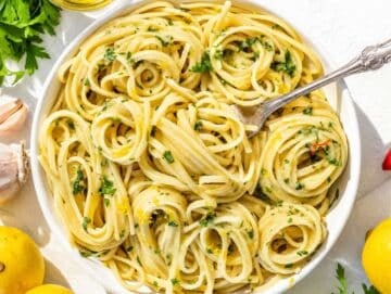 Step 4 Parsley and parmesan folded into Lemon Pasta before serving immediately.