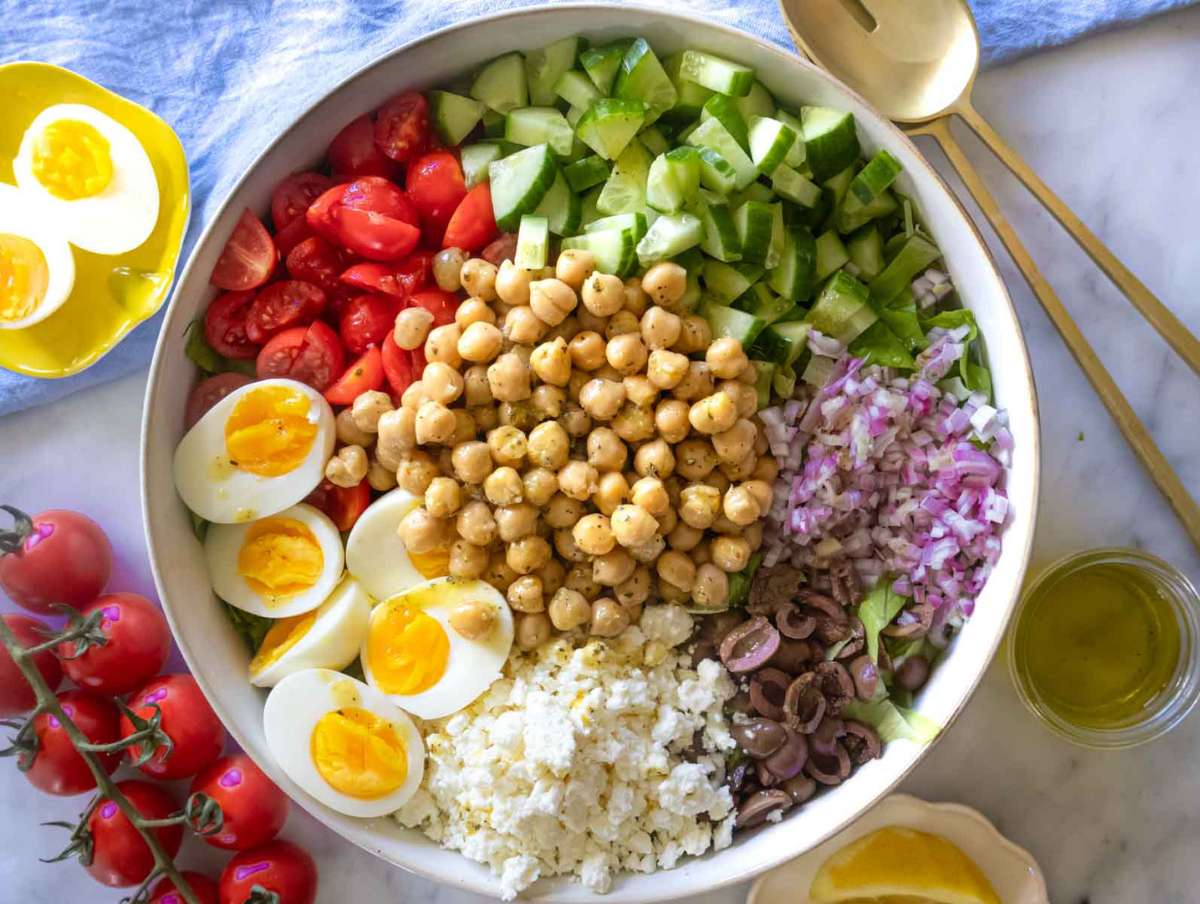 Step 5 and 6 - All salad components combined in a large mixing bowl before tossing.