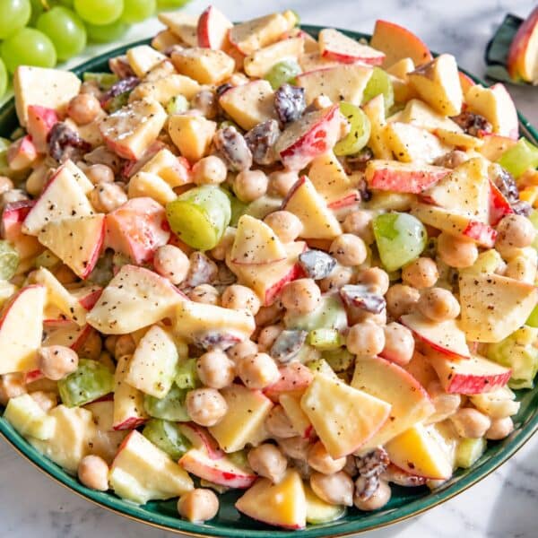 Apple chickpea salad with crisp fruit, chickpeas, pecans, and creamy dressing.