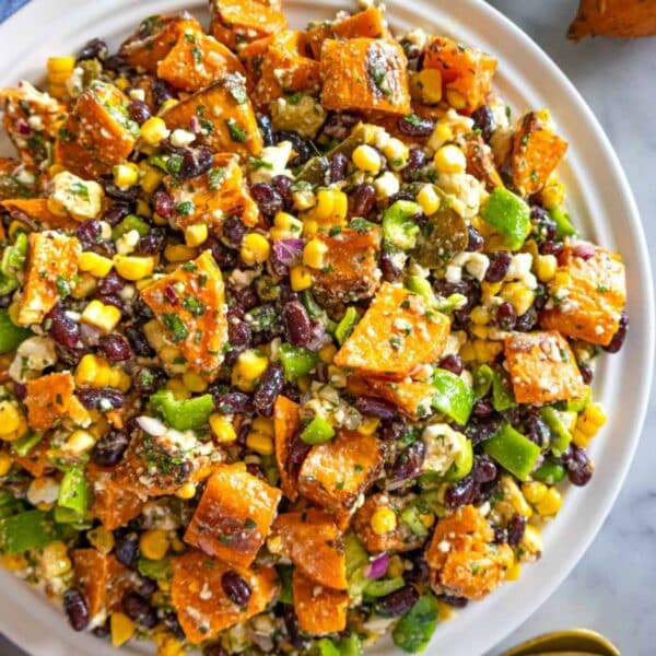 Black bean corn salad with cilantro lime dressing served as healthy high protein salad recipe.