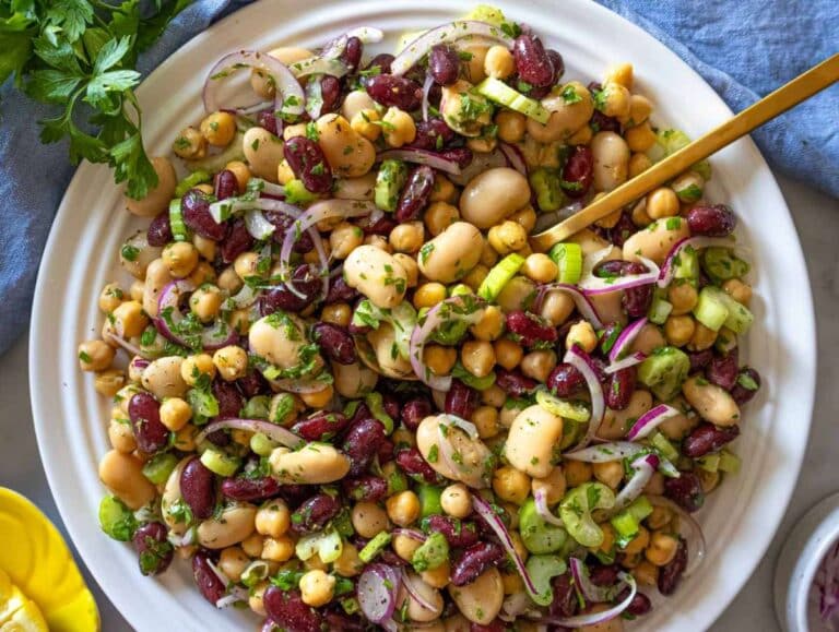 Step 3 Finished 3 bean salad recipe chilling in bowl ready to serve with parsley.