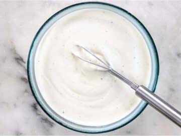 Greek yogurt dressing mixed in a small bowl.