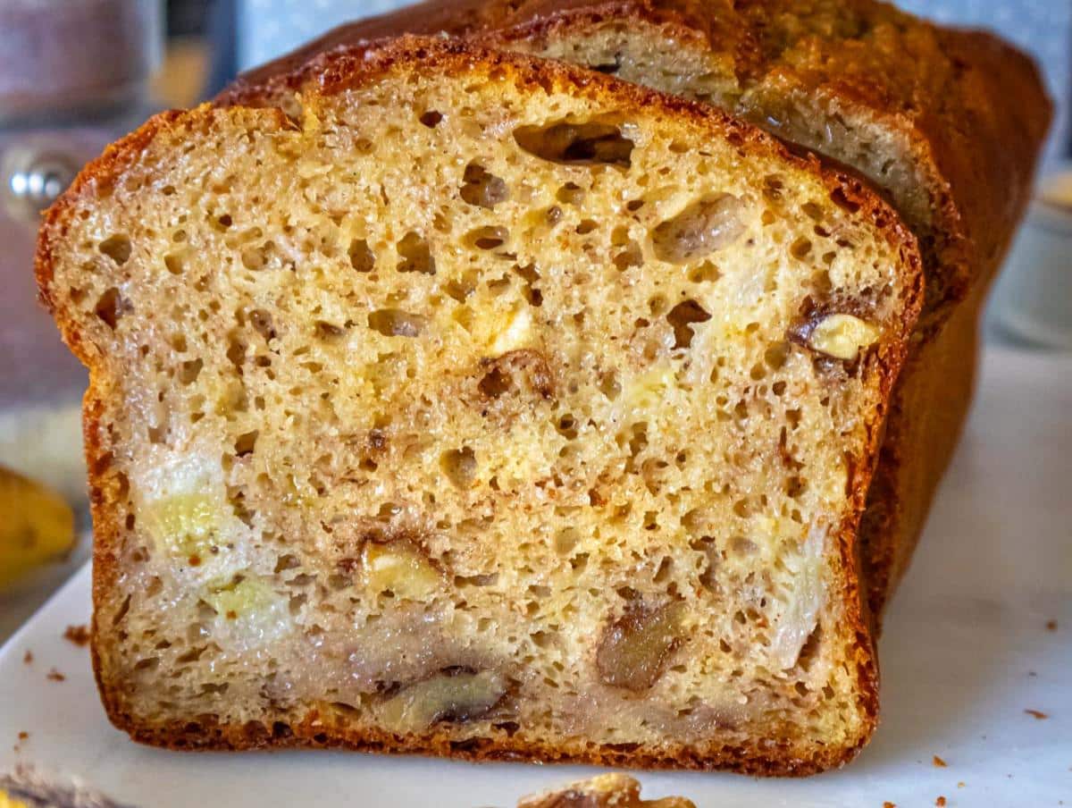 High protein banana bread with Greek yogurt and bananas sliced.