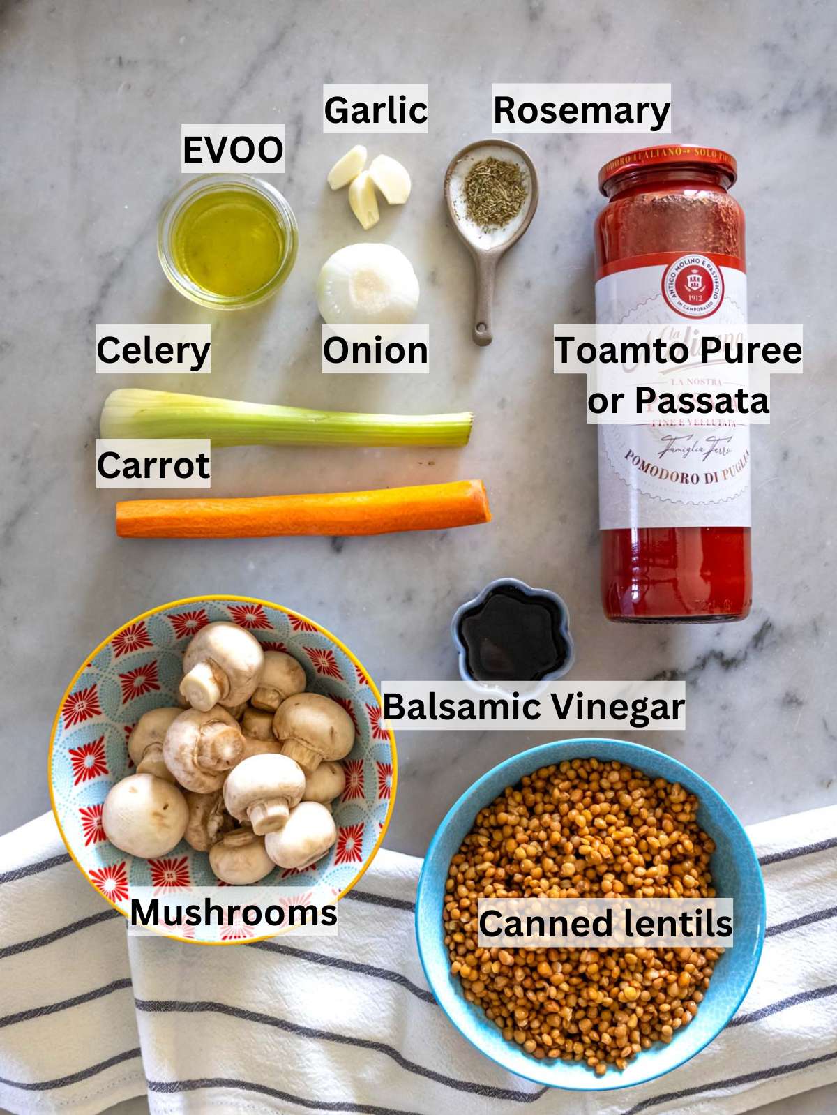 Ingredients for easy lentil bolognese with canned lentils vegetables and tomato puree.