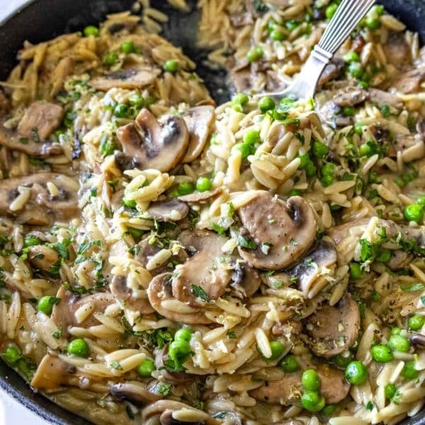 Mushroom orzo with green peas.