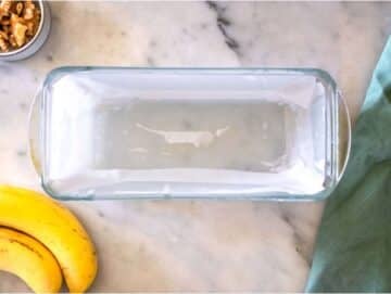 Step 1 Lined loaf pan ready for baking protein banana bread.