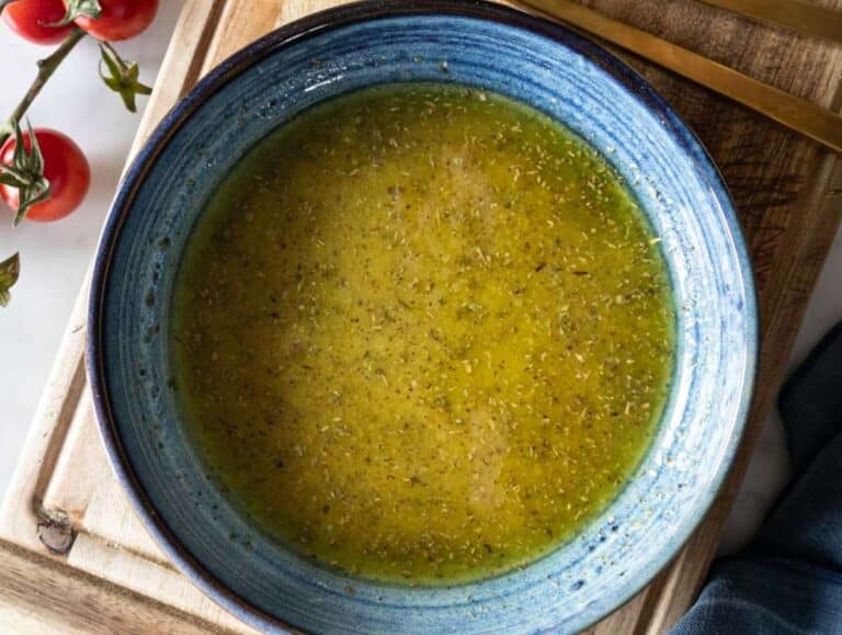 Step 1 Whisking olive oil lemon juice Dijon mustard honey and oregano together in a small bowl.