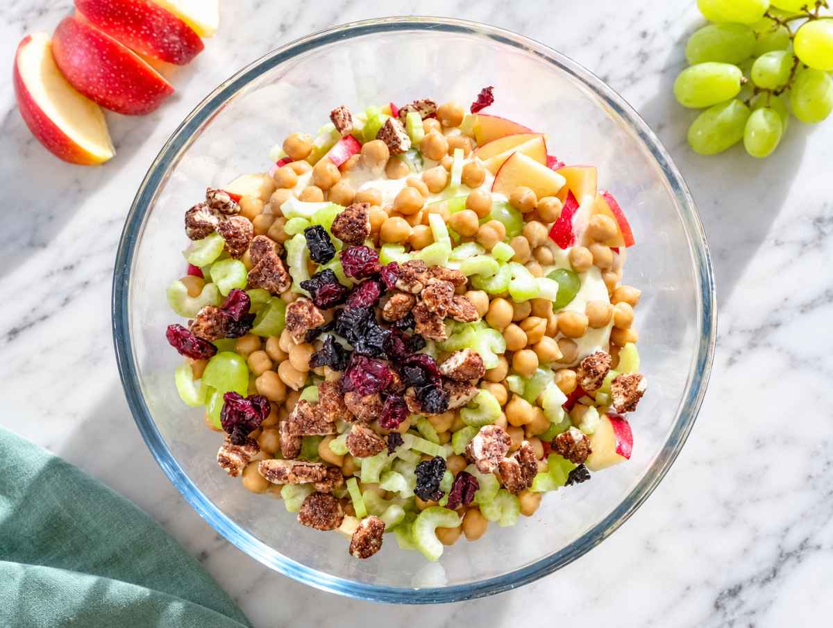 Step 2 Diced apples, chickpeas, celery, grapes, pecans, and cranberries combined together.