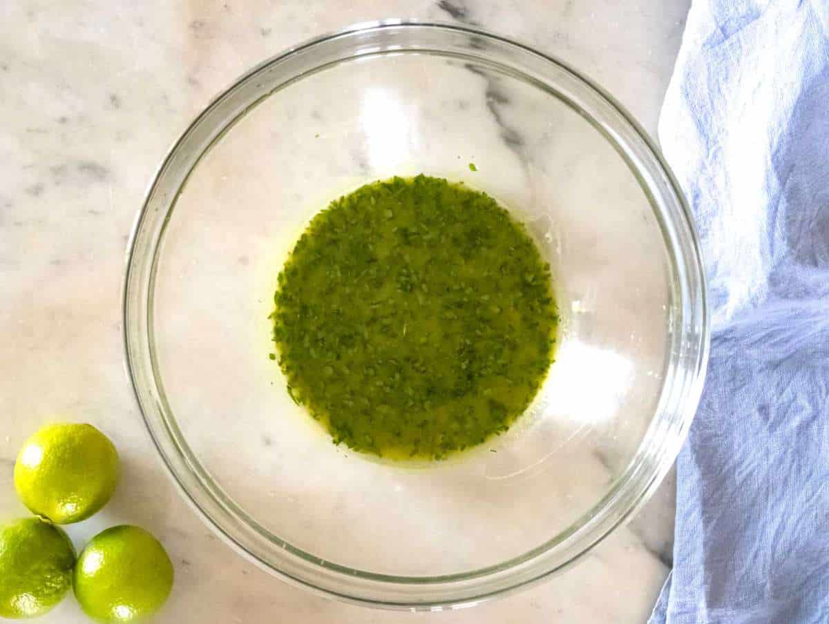 Step 2 Fresh cilantro lime honey and Dijon mustard whisked together for black bean corn salad dressing.