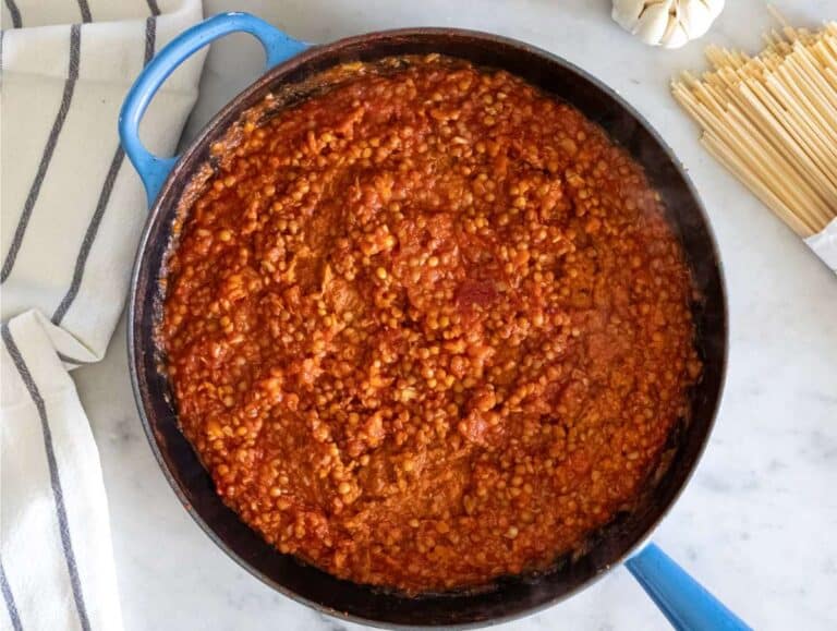 Step 2 Lentils and tomato puree simmering in one pot for bolognese sauce.