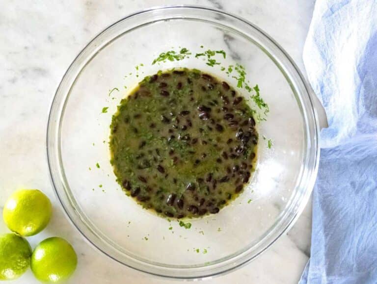 Step 3 Black beans rinsed and tossed in cilantro lime dressing to marinate.