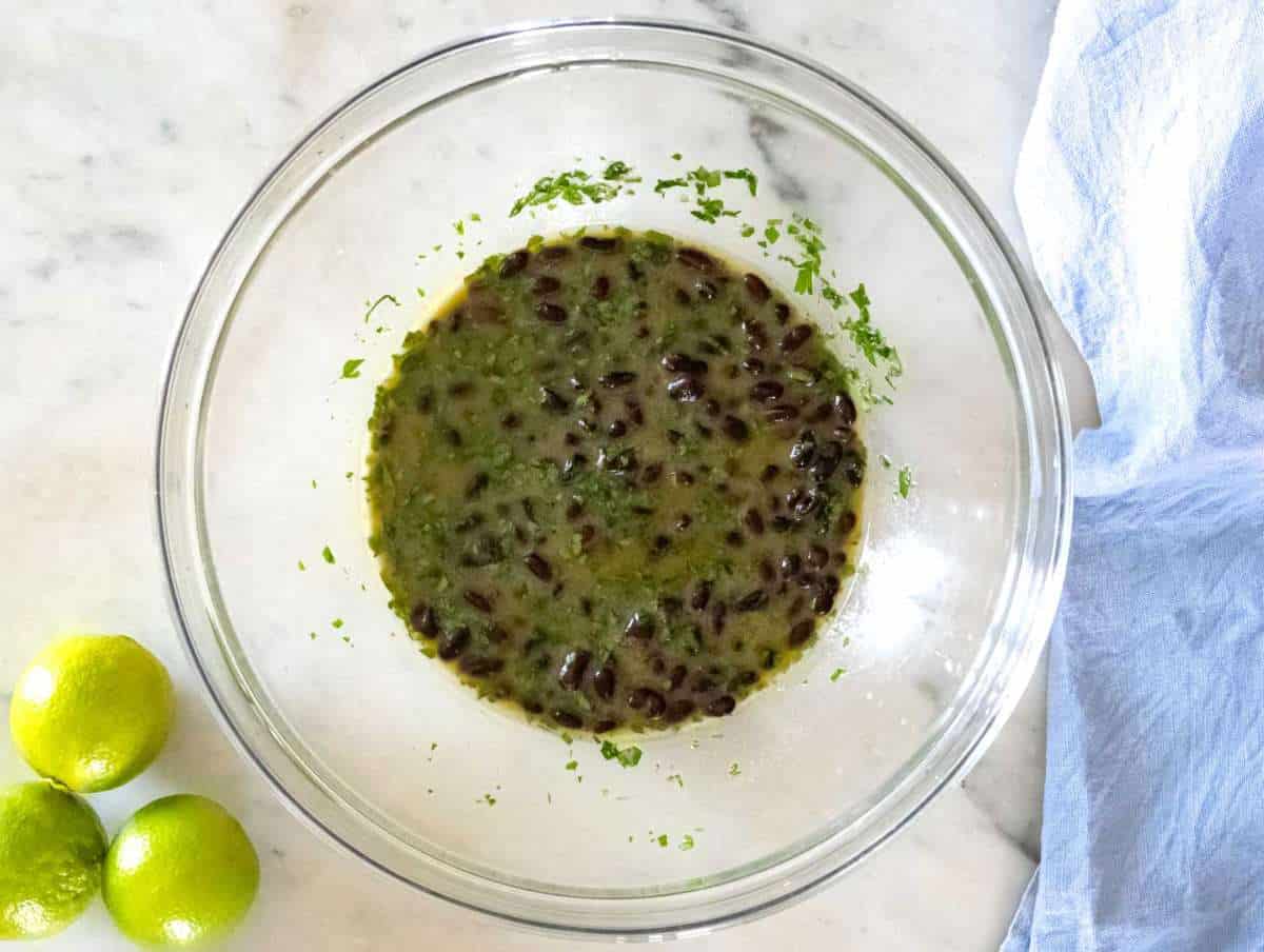 Step 3 Black beans rinsed and tossed in cilantro lime dressing to marinate.