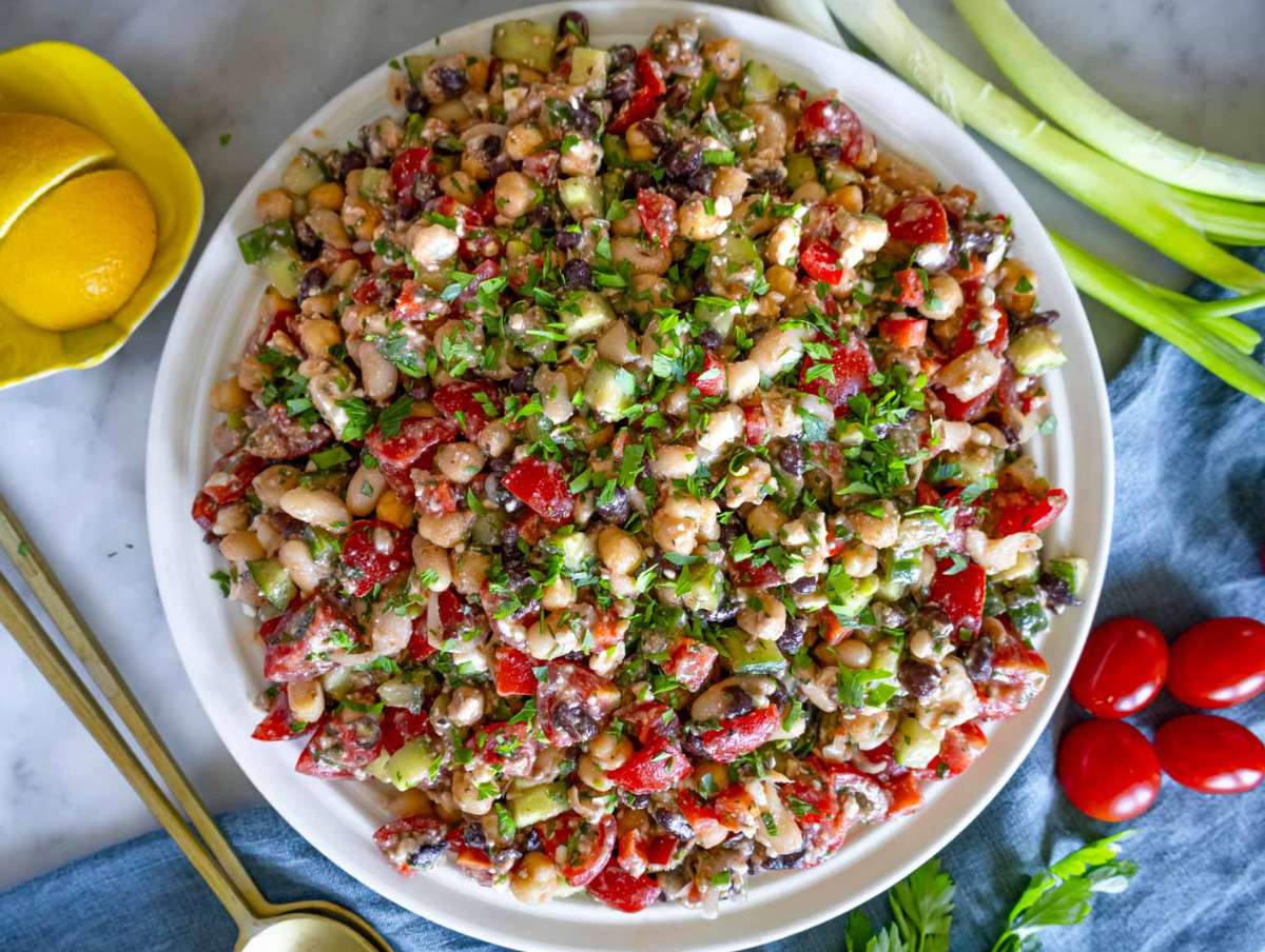 Step 4 High-protein dense bean salad served on a white platter.
