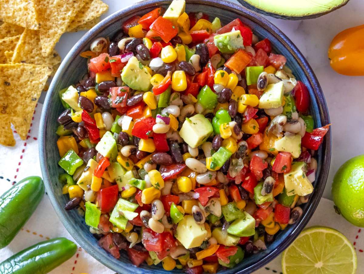 Step 4 Serving Cowboy Caviar dip with tortilla chips as a fresh colorful appetizer.