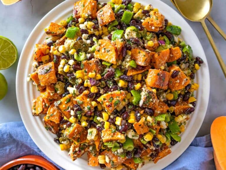 Step 5 Finished black bean corn salad served on a platter with cilantro lime dressing ready to serve