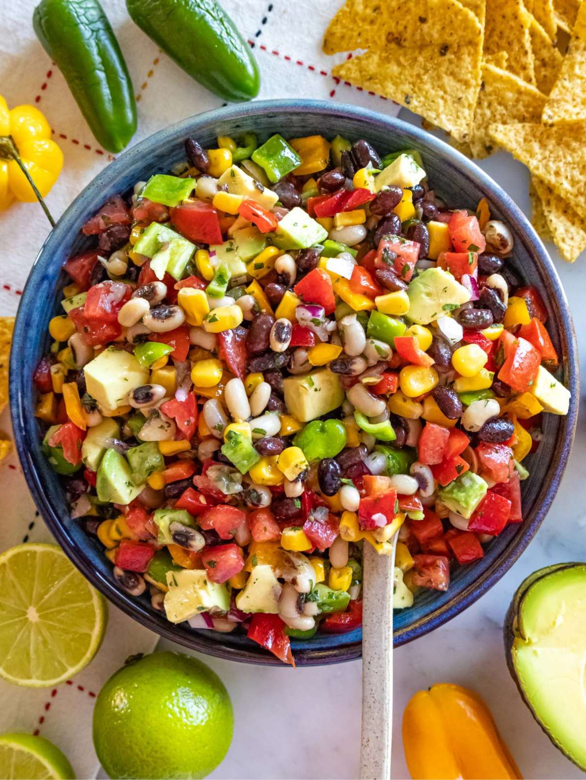Top down view of Cowboy Caviar salad served with tortilla chips.