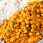 Coconut curry with chickpeas in skillet creamy one pot curry dinner with rice.