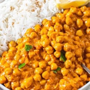 Coconut curry with chickpeas in skillet creamy one pot curry dinner with rice.