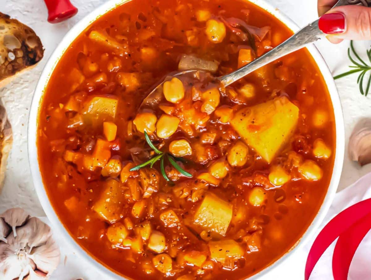 Hearty Mediterranean chickpea soup served hot with bread healthy one pot family recipe.