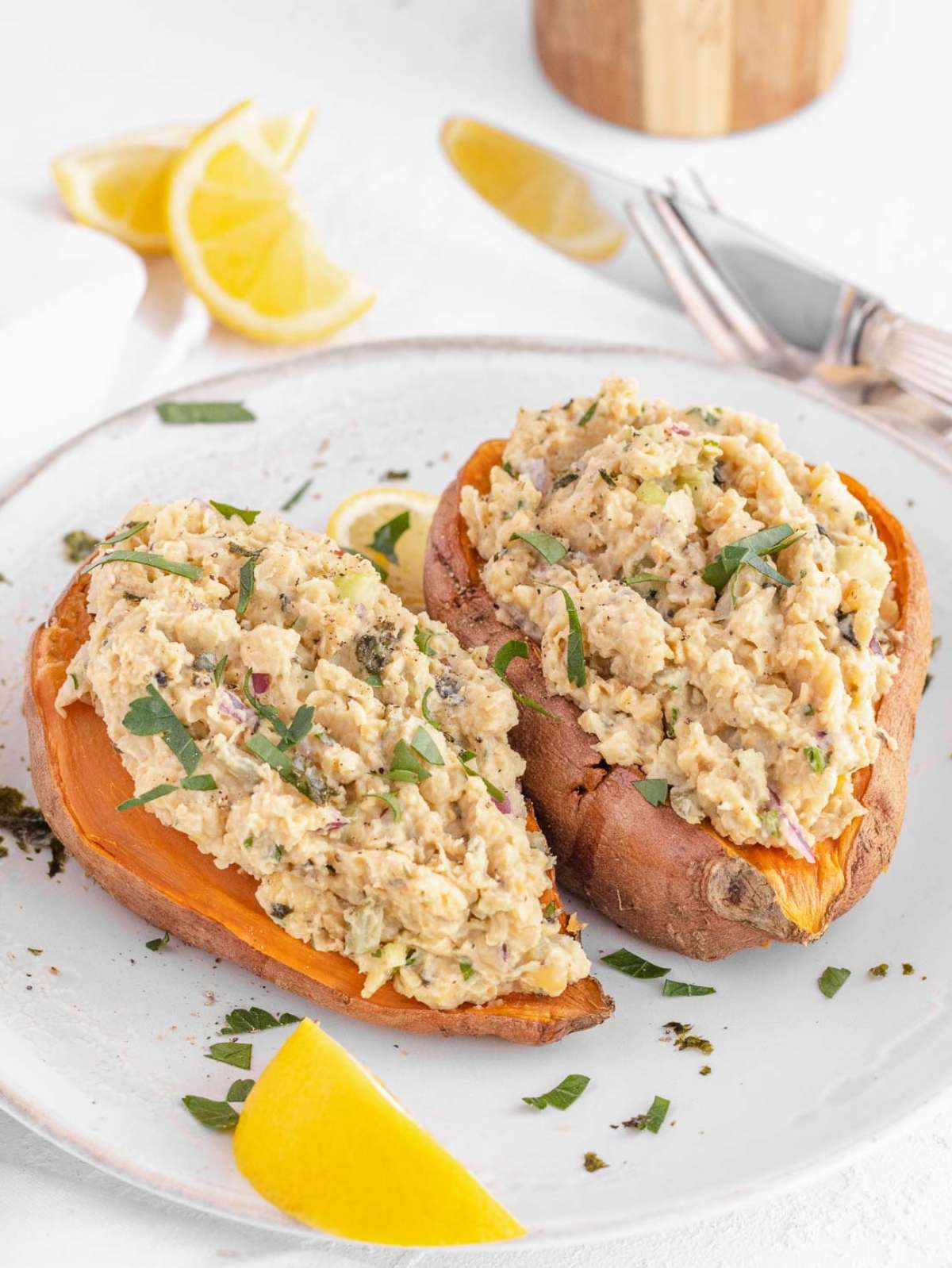 Smashed chickpea salad with Greek yogurt served in microwaved sweet potatoes.