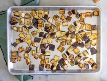 Step 1 Cubed eggplant tossed with olive oil salt and pepper after roasting in the oven.